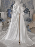 Load image into Gallery viewer, White One Shoulder Formal Gown with Ruched Bodice, Sculptural Side Bow and Asymmetrical Draped Silhouette