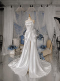 Load image into Gallery viewer, White One Shoulder Formal Gown with Ruched Bodice, Sculptural Side Bow and Asymmetrical Draped Silhouette