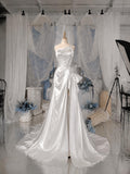 Load image into Gallery viewer, White One Shoulder Formal Gown with Ruched Bodice, Sculptural Side Bow and Asymmetrical Draped Silhouette