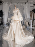 Load image into Gallery viewer, Ivory One Shoulder Wedding Gown with Floral Accent, Draped Bodice, Sculptural Ruffle Skirt and Statement Sleeve