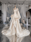 Load image into Gallery viewer, Ivory One Shoulder Wedding Gown with Floral Accent, Draped Bodice, Sculptural Ruffle Skirt and Statement Sleeve