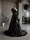 Load image into Gallery viewer, Black One Shoulder Gown with Oversized Bow Detail, Ruched Waist and Dramatic Draped Formal Silhouette