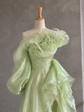 Load image into Gallery viewer, Light Green Asymmetrical Ruffle Statement Gown with Sculptural Neckline, Dramatic Sleeve and Cascading Side Detail