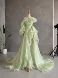 Load image into Gallery viewer, Light Green Asymmetrical Ruffle Statement Gown with Sculptural Neckline, Dramatic Sleeve and Cascading Side Detail