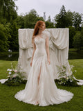 Load image into Gallery viewer, White Asymmetrical Bridal Gown with Floral Shoulder, Sculpted Bodice, Front Slit and Flowing Floor Length Skirt