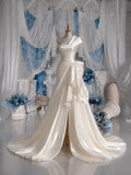 Load image into Gallery viewer, Ivory Asymmetric Wedding Gown with Sculptural Draping, Modern Bridal Dress, Made to Measure