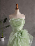 Load image into Gallery viewer, Light Green Strapless Formal Gown with Draped Bodice, Floral Waist Detail and Asymmetrical Flowing Skirt