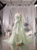 Load image into Gallery viewer, Green Sculptural Ruffle Gown with Dramatic Draped Bodice and Statement Formal Silhouette