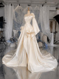 Load image into Gallery viewer, Ivory One Shoulder Wedding Gown with Floral Accent, Draped Bodice, Sculptural Ruffle Skirt and Statement Sleeve