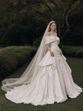 Load image into Gallery viewer, Ivory Statement Wedding Dress with Flowing Skirt and Refined Bridal Silhouette