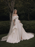 Load image into Gallery viewer, Ivory Statement Wedding Dress with Flowing Skirt and Refined Bridal Silhouette