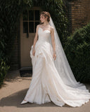 Load image into Gallery viewer, Ivory Wedding Gown with Graceful Full Length Silhouette and Dramatic Bridal Train