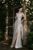 Load image into Gallery viewer, Ivory Statement Wedding Dress with Flowing Skirt and Refined Bridal Silhouette