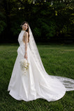 Load image into Gallery viewer, White Wedding Gown with Graceful Full Length Silhouette and Dramatic Bridal Train