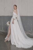 Load image into Gallery viewer, Ivory Statement Wedding Dress with Flowing Skirt and Refined Bridal Silhouette