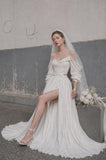 Load image into Gallery viewer, Ivory Statement Wedding Dress with Flowing Skirt and Refined Bridal Silhouette