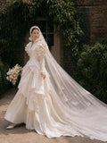 Load image into Gallery viewer, Ivory Wedding Gown with Graceful Full Length Silhouette and Dramatic Bridal Train