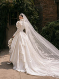 Load image into Gallery viewer, Ivory Wedding Gown with Graceful Full Length Silhouette and Dramatic Bridal Train