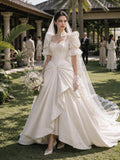 Load image into Gallery viewer, Ivory Statement Wedding Dress with Flowing Skirt and Refined Bridal Silhouette