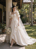 Load image into Gallery viewer, Ivory Statement Wedding Dress with Flowing Skirt and Refined Bridal Silhouette