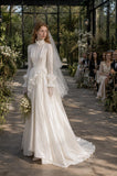 Load image into Gallery viewer, Ivory Wedding Gown with Graceful Full Length Silhouette and Dramatic Bridal Train