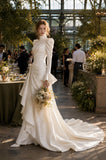 Load image into Gallery viewer, Ivory Statement Wedding Dress with Flowing Skirt and Refined Bridal Silhouette