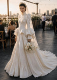 Load image into Gallery viewer, Ivory Statement Wedding Dress with Flowing Skirt and Refined Bridal Silhouette