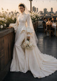 Load image into Gallery viewer, Ivory Statement Wedding Dress with Flowing Skirt and Refined Bridal Silhouette