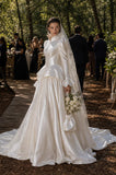 Load image into Gallery viewer, Ivory Statement Wedding Dress with Flowing Skirt and Refined Bridal Silhouette