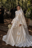 Load image into Gallery viewer, Ivory Statement Wedding Dress with Flowing Skirt and Refined Bridal Silhouette