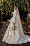 Load image into Gallery viewer, Ivory Statement Wedding Dress with Flowing Skirt and Refined Bridal Silhouette