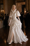 Load image into Gallery viewer, Ivory Wedding Gown with Graceful Full Length Silhouette and Dramatic Bridal Train