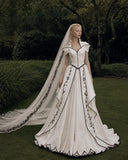 Load image into Gallery viewer, Ivory Wedding Gown with Graceful Full Length Silhouette and Dramatic Bridal Train