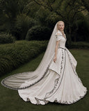 Load image into Gallery viewer, Ivory Wedding Gown with Graceful Full Length Silhouette and Dramatic Bridal Train