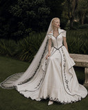 Load image into Gallery viewer, Ivory Wedding Gown with Graceful Full Length Silhouette and Dramatic Bridal Train