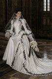 Load image into Gallery viewer, Ivory Statement Wedding Dress with Flowing Skirt and Refined Bridal Silhouette