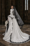 Load image into Gallery viewer, Ivory Statement Wedding Dress with Flowing Skirt and Refined Bridal Silhouette