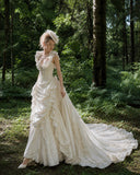 Load image into Gallery viewer, Ivory Wedding Gown with Graceful Full Length Silhouette and Dramatic Bridal Train