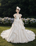 Load image into Gallery viewer, Ivory Statement Wedding Dress with Flowing Skirt and Refined Bridal Silhouette
