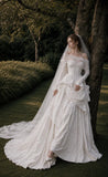 Load image into Gallery viewer, Ivory Statement Wedding Dress with Flowing Skirt and Refined Bridal Silhouette