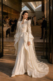 Load image into Gallery viewer, Ivory Statement Wedding Dress with Flowing Skirt and Refined Bridal Silhouette