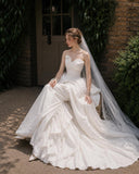 Load image into Gallery viewer, Ivory Wedding Gown with Graceful Full Length Silhouette and Dramatic Bridal Train