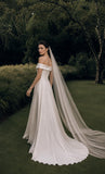 Load image into Gallery viewer, Ivory Bridal Gown with Flowing Train, Elegant Wedding Dress for Formal Ceremony