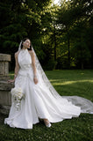 Load image into Gallery viewer, White Wedding Gown with Graceful Full Length Silhouette and Dramatic Bridal Train