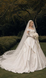 Load image into Gallery viewer, Ivory Statement Wedding Dress with Flowing Skirt and Refined Bridal Silhouette