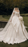Load image into Gallery viewer, Ivory Statement Wedding Dress with Flowing Skirt and Refined Bridal Silhouette
