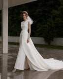 Load image into Gallery viewer, Ivory Statement Wedding Dress with Flowing Skirt and Refined Bridal Silhouette