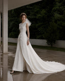 Load image into Gallery viewer, Ivory Statement Wedding Dress with Flowing Skirt and Refined Bridal Silhouette
