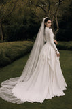 Load image into Gallery viewer, Ivory Wedding Gown with Graceful Full Length Silhouette and Dramatic Bridal Train
