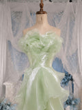 Load image into Gallery viewer, Sage Green Ruffle Gown with Sculptural Floral Bodice and Flowing Asymmetrical Skirt